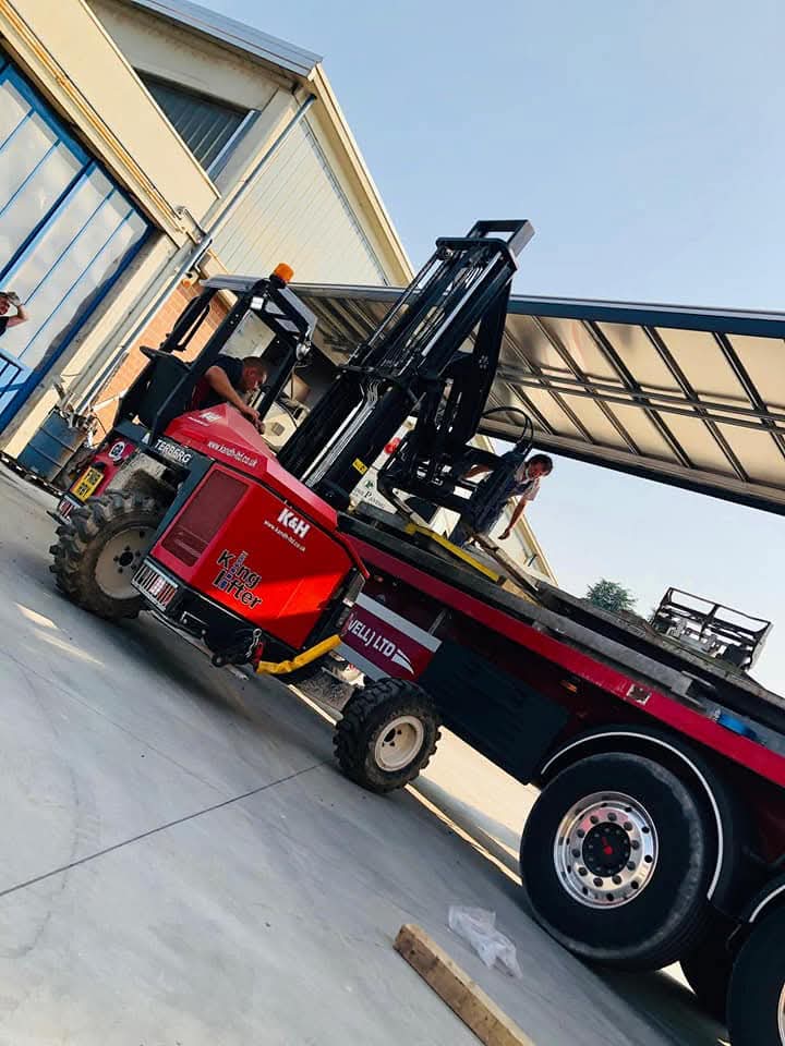 white K&H (Bakewell) Limited DAF truck pulling curtainside trailer